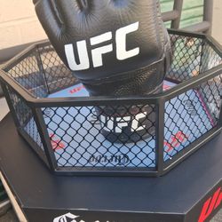 Jose Cuervo promotional UFC octagon display, featuring a miniature replica of the octagon and a UFC fight glove. 