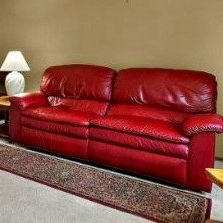 Red Leather sofa, recliner, good condition 76×36×36