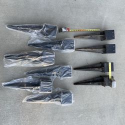Fence post anchors. 4 used, 6 new. 