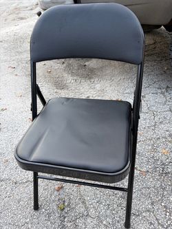 7 Black Padded Metal Folding Chairs