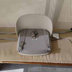 Booster seat for sitting at table in Margate