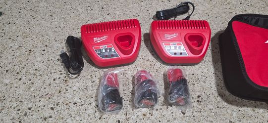 Milwaukee M12 Fuel 3 batteries and 2 chargers