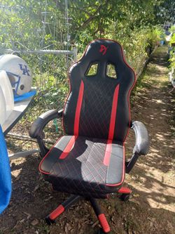 Used Gaming chair with leg Rest a little ware and tear