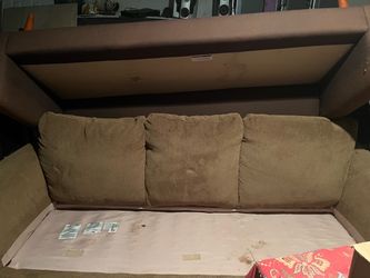 2  brown sofas