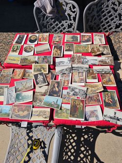 Over 50 antique stamped 1930s postcards religious and others