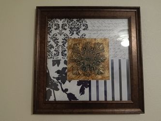 Brown frame medallion wall art