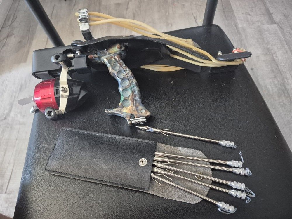 Laser Sight Slingshot/Wrist Rocket With Fishing Reel And Spears