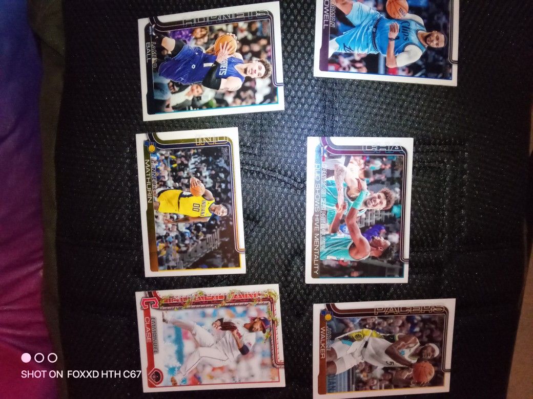 Stack Of Baseball And Basketball Cards