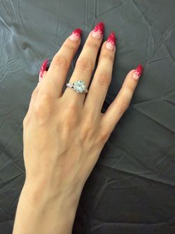 Genuine round 2 carat aquamarine solitaire, size 6 in 10 karat white gold