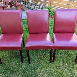 6 red dining chairs