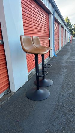 Whiskey Brown Faux Leather Swivel Adjustable Bar Stools (Set of 2)