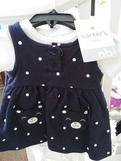 Carters new with tag. Size 0-3 dress with long sleeve onesie.