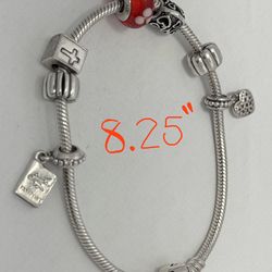 1 Pandora 8.25” bracelet with 5 charm and 2 clips