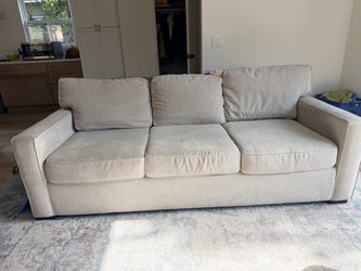 Couch and storage ottoman