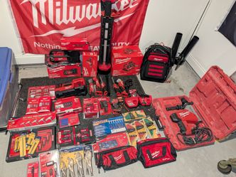 Milwaukee tools, large assortment of Milwaukee power tools and miscellaneous hand tools.