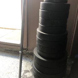 Weight Plates Total Of 250 Pounds And Barbell 