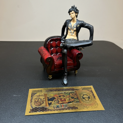 Trafalgar law figurine sittin on chair