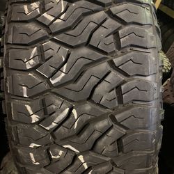 One used tire size 37x23.50R24