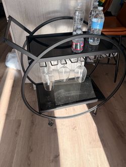 Bar cart with 8 wine glasses