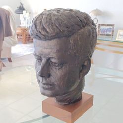 Austin productions Kennedy bust on wood stand 1964