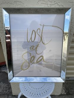 Framed Sea Themed Art.