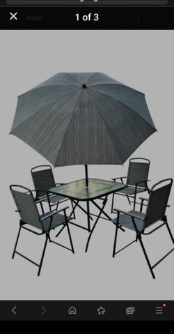 patio set table. chairs and umbrella