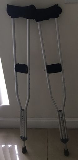 Almost new adjustable crutches with padding