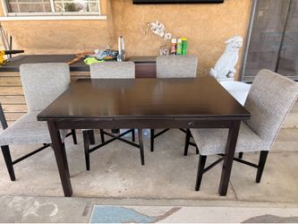 Sturdy Dining Room Table- Dark stained wood