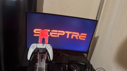 Ps5 Controller and Spectre 240 hz Curved gaming monitor.