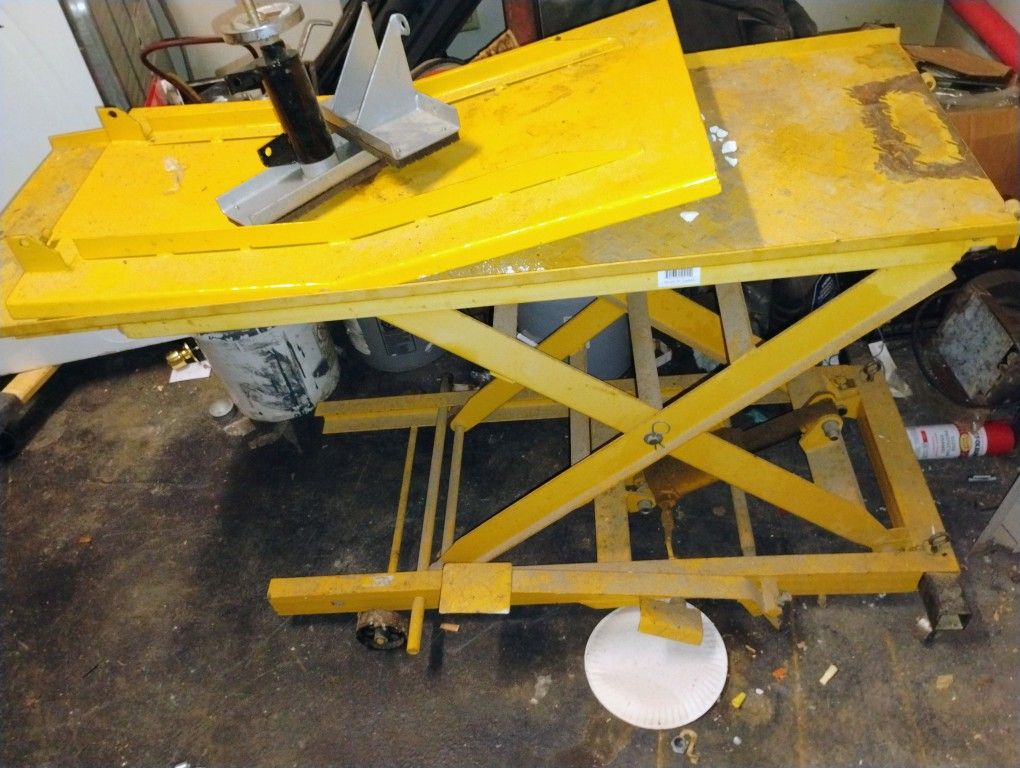2 Yellow Motorcycle Lifts Pittsburgh