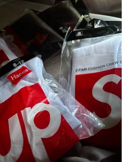 Hanes x supreme socks .