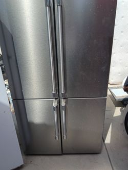 550 four door refrigerator cuz of 90 day warranty free parts and labor deliveries available