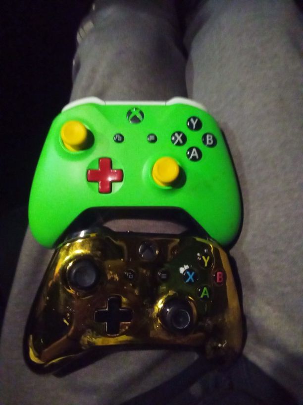 Pair of Xbox One/X controllers w/recharge packs
