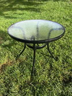 Patio center table 24” tall by 28.5” wide