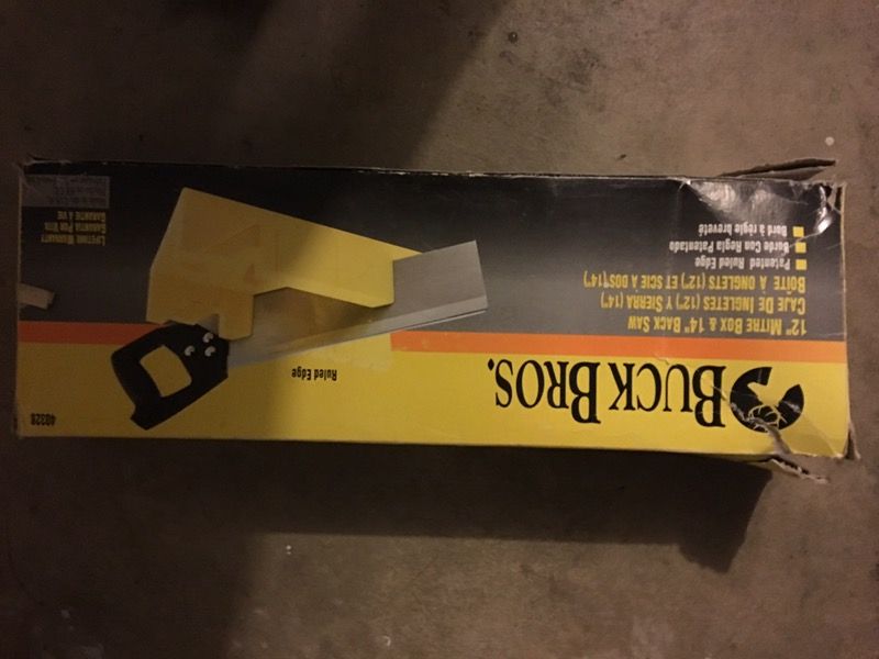 Miter box with saw
