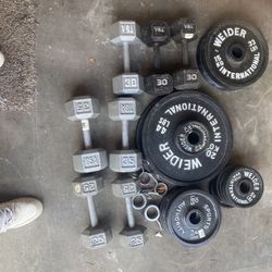 WEIDER OLYMPIC WEIGHTS/. $50-$150