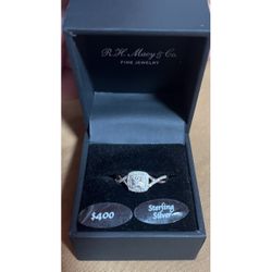 Diamond Ring (1/5 ct. t.w.) in Sterling Silver