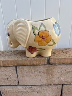 Ceramic elephant planter with floral design