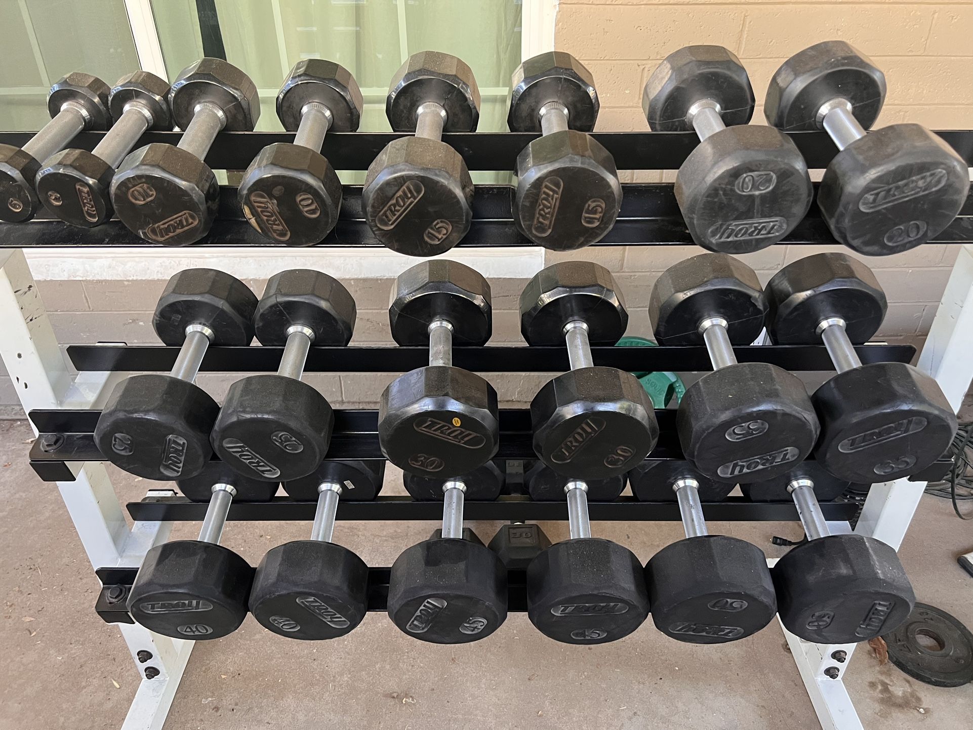 Troy 5-50lb rubber coated dumbbell set with heavy duty 3 tier rack
