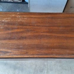 This Is An Old Drop Leaf Lions Feet Coffee Table Brown in color wood
