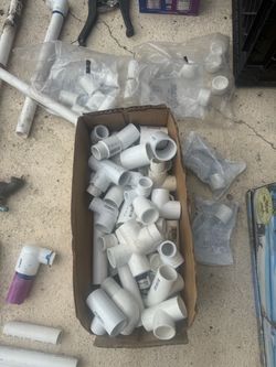 1/2” and 3/ 4” sprinkler parts, sprinklers, and some pipe