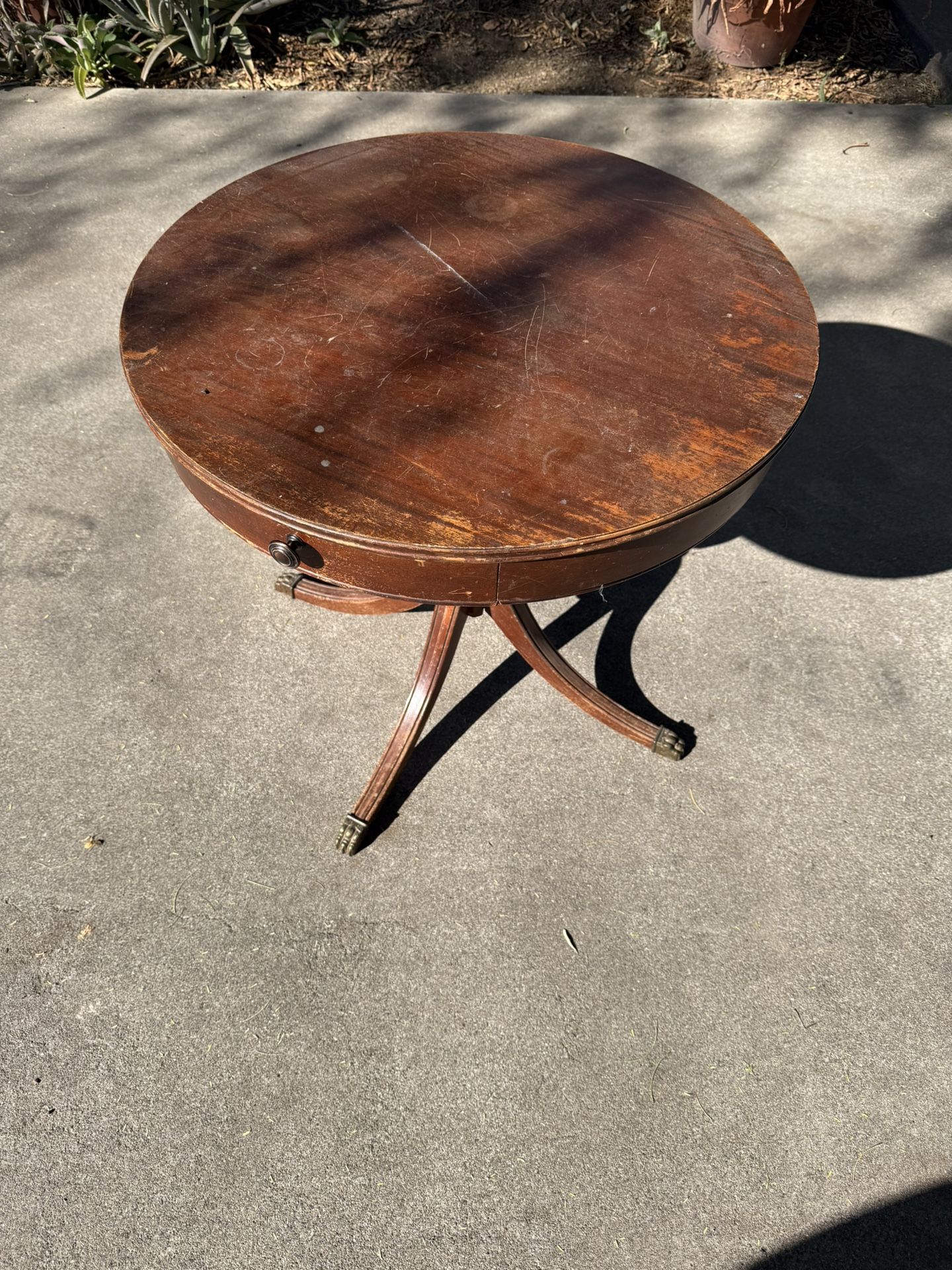 Antique Round Table With Brass Feet