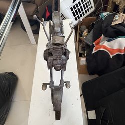 A Bricolage/Folk Art motorcycle art piece