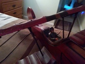 Antique hand carved all wood WW l plane has rubber tires