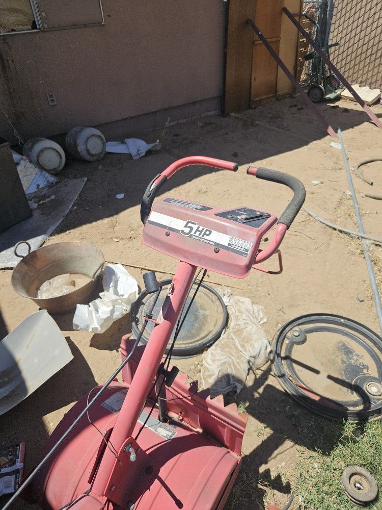 Huskee 18" Rear Tine Tiller with a 5HP engine