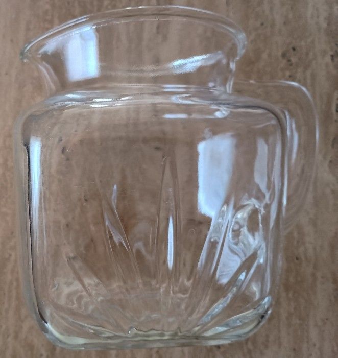 Small 1950s Vintage Federal Glass starburst juice pitcher.