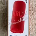 Jbl grip Bluetooth speaker in red brand  new in the box  get cheap last one