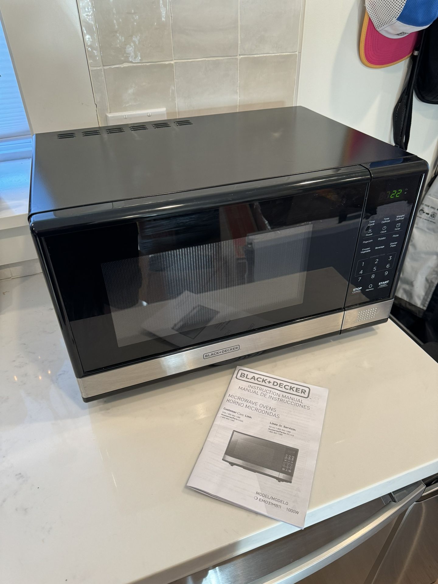 Used BLACK+DECKER EM031MB11 Digital Microwave w Turntable, 1000W, 1.1cu ft., Black & Stainless Steel