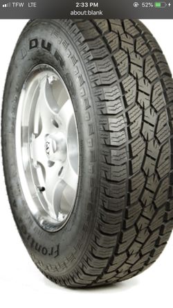 Tires all different sizes and different brands