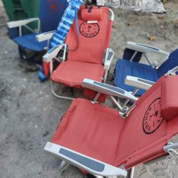 Set of Tommy Bahama beach chairs in red and blue. $150 for all 4 chairs umbrella 
